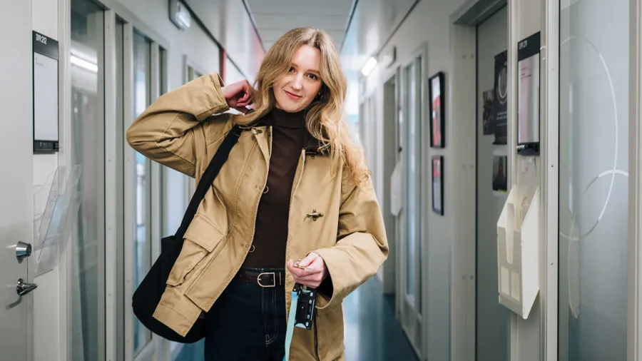 Woman walking in corridors.