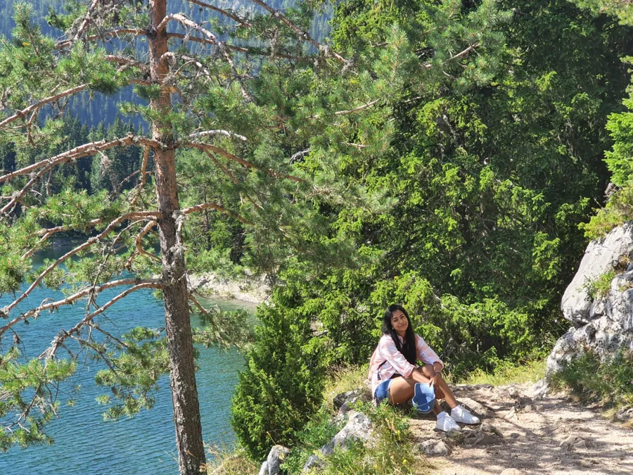 Twinkle Biswas sits in beautiful nature. 